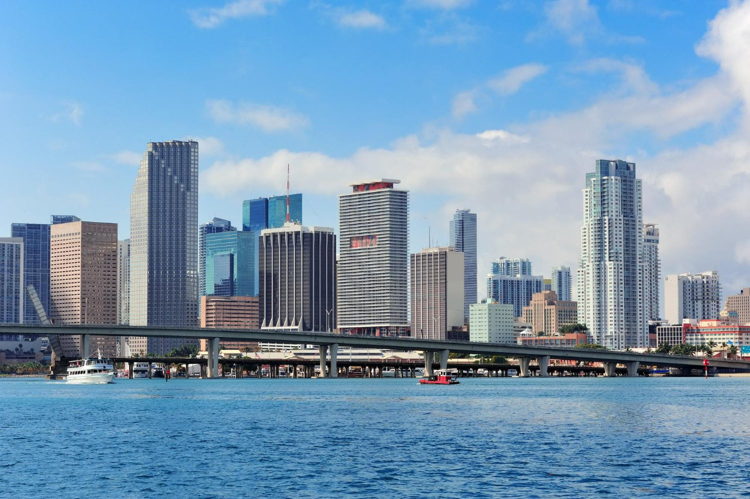 miami-skyscrapers-with-bridge-sea-day